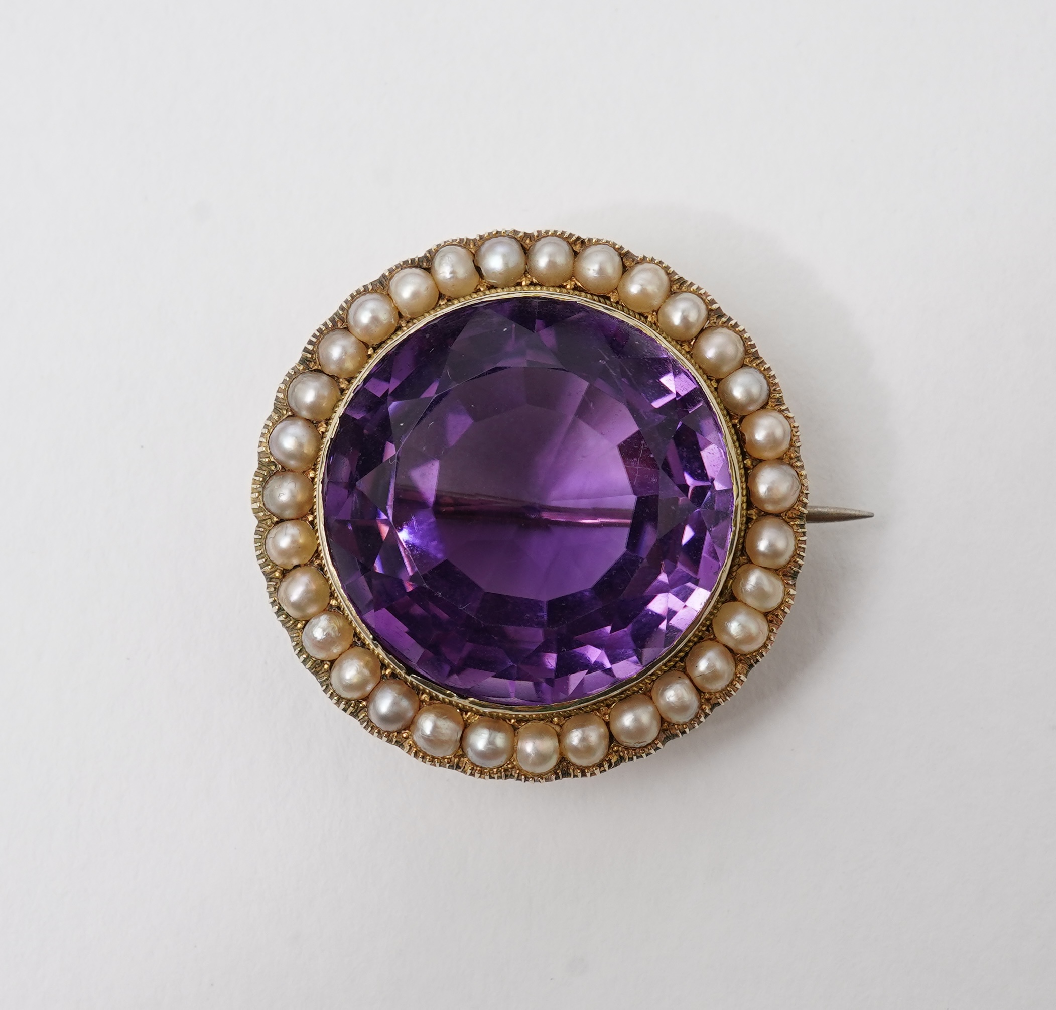 An Edwardian amethyst and seed pearl brooch, early 20th century